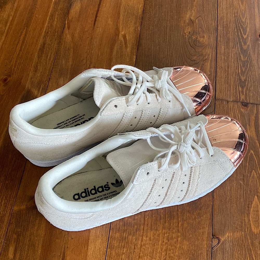 NEW Adidas sneakers with rose gold toe caps.